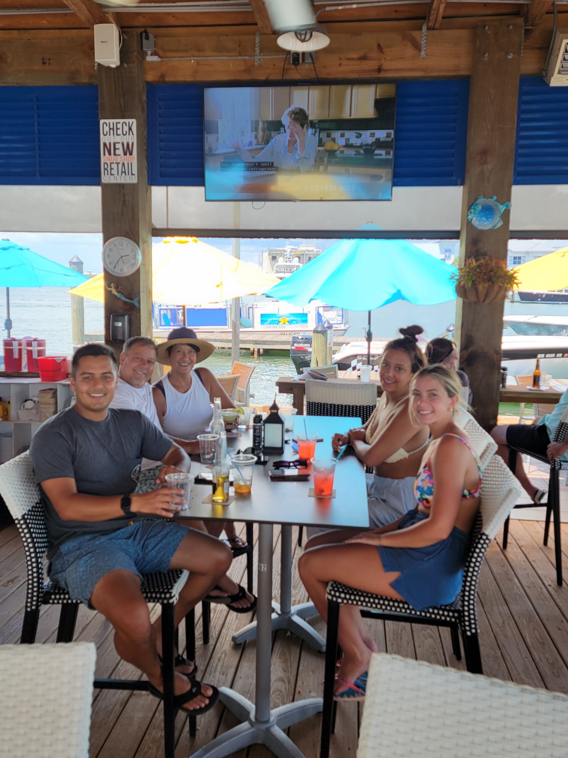 a group of people sitting at a table